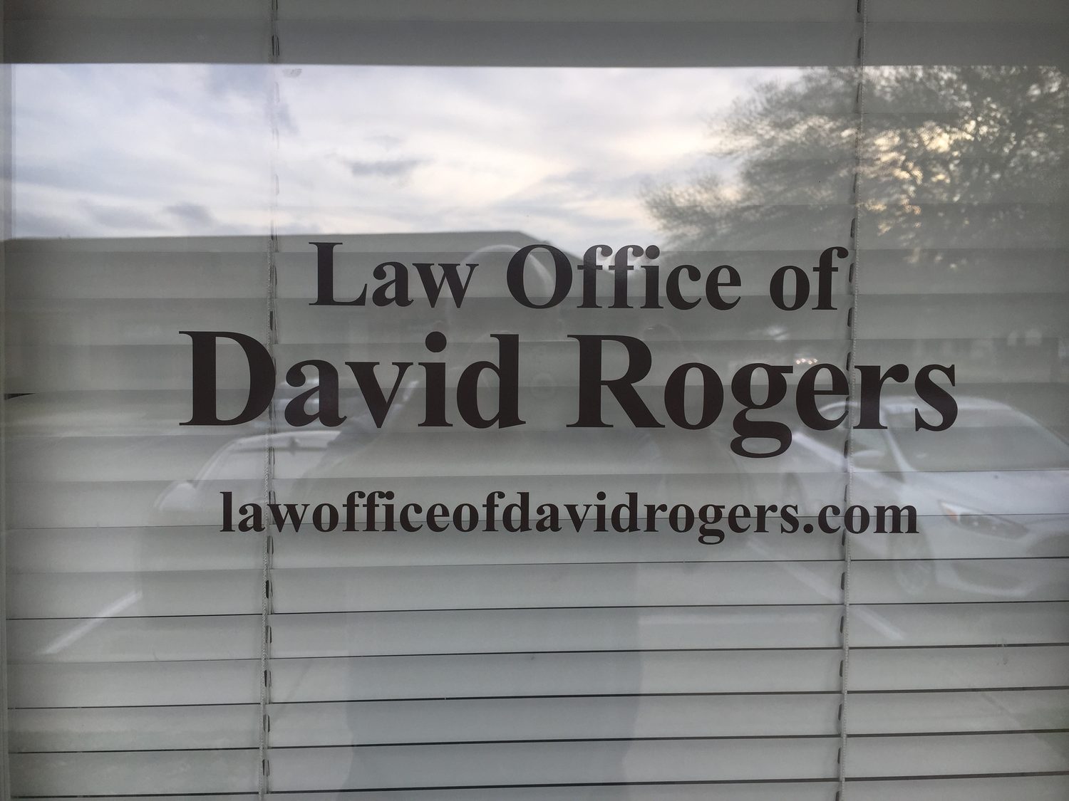 The Law Office of David Rogers window sign