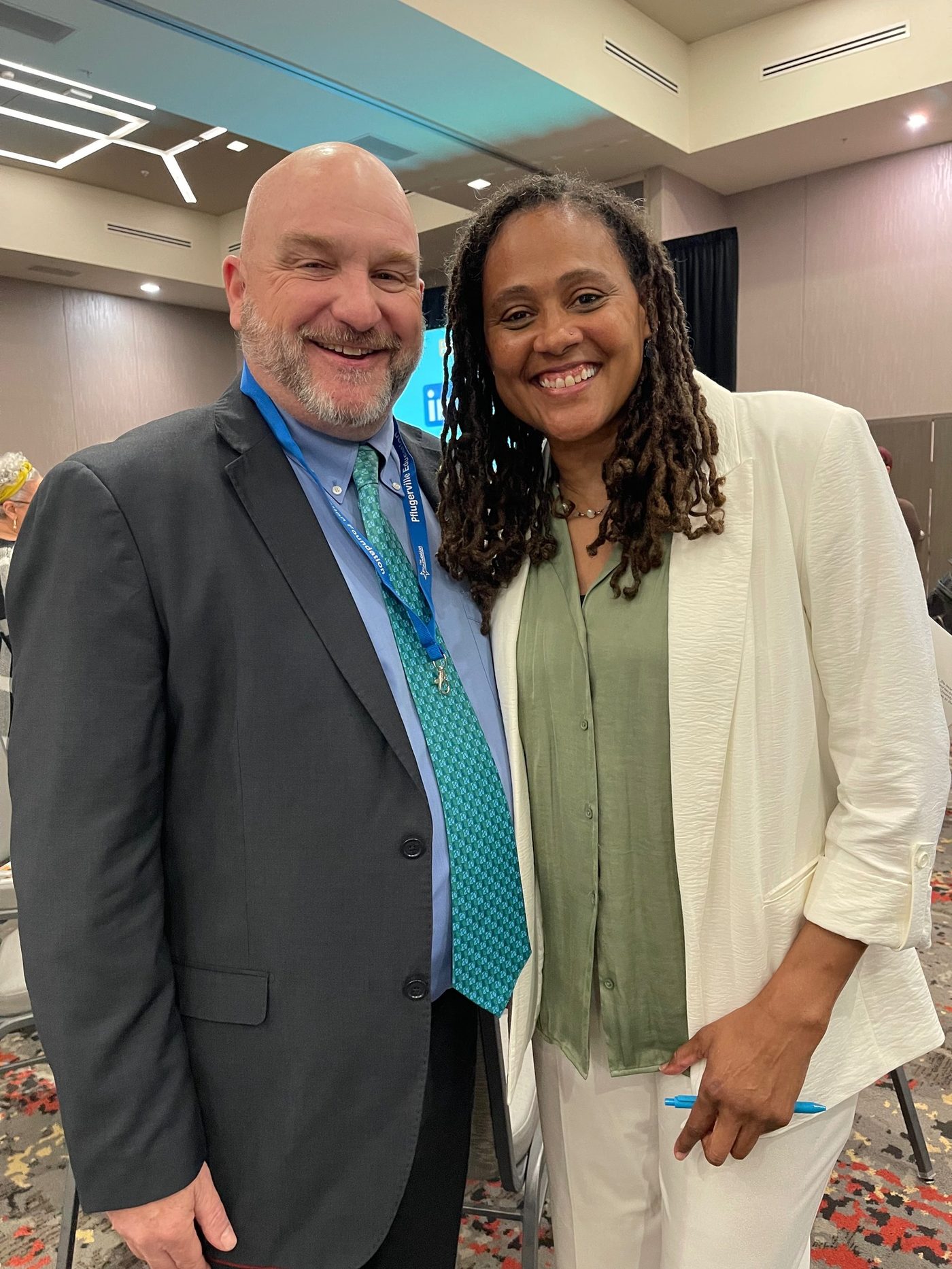 David Rogers with Olympic champion and Pflugerville resident Marion Jones at a Pflugerville Education Foundation event