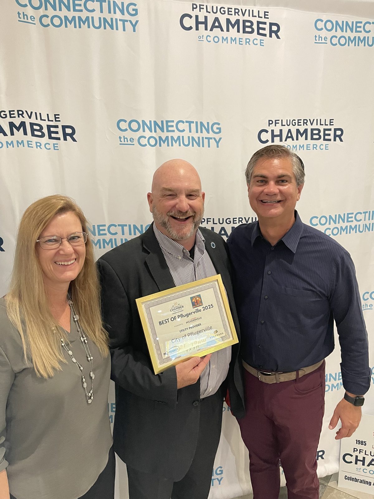 David Rogers with Councilwoman Melody Ryan and Mayor Doug Weiss at a Chamber of Commerce event